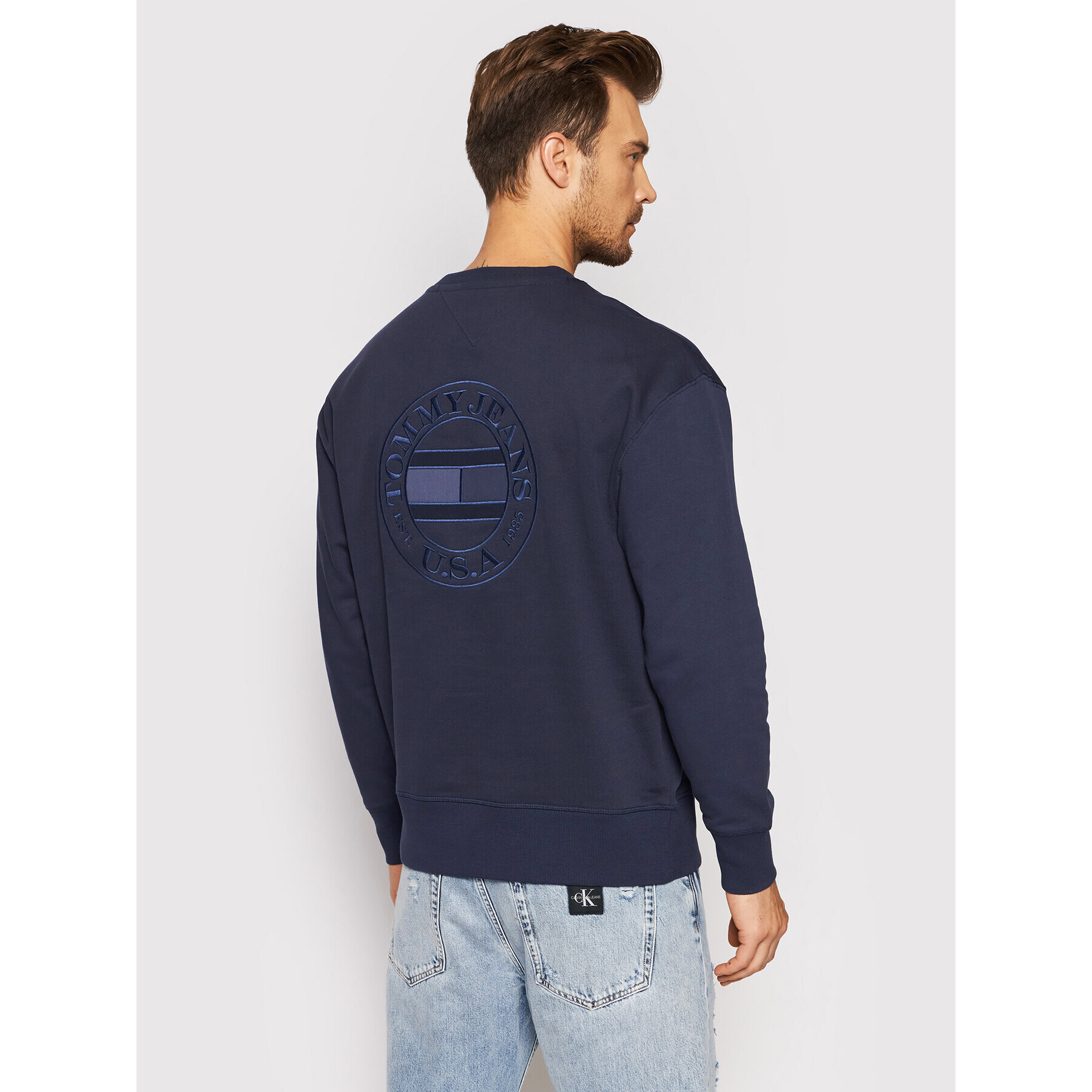 Tommy Jeans Bluză Tonal Circular Graphic Crew DM0DM11634 Bleumarin Relaxed Fit - Pled.ro