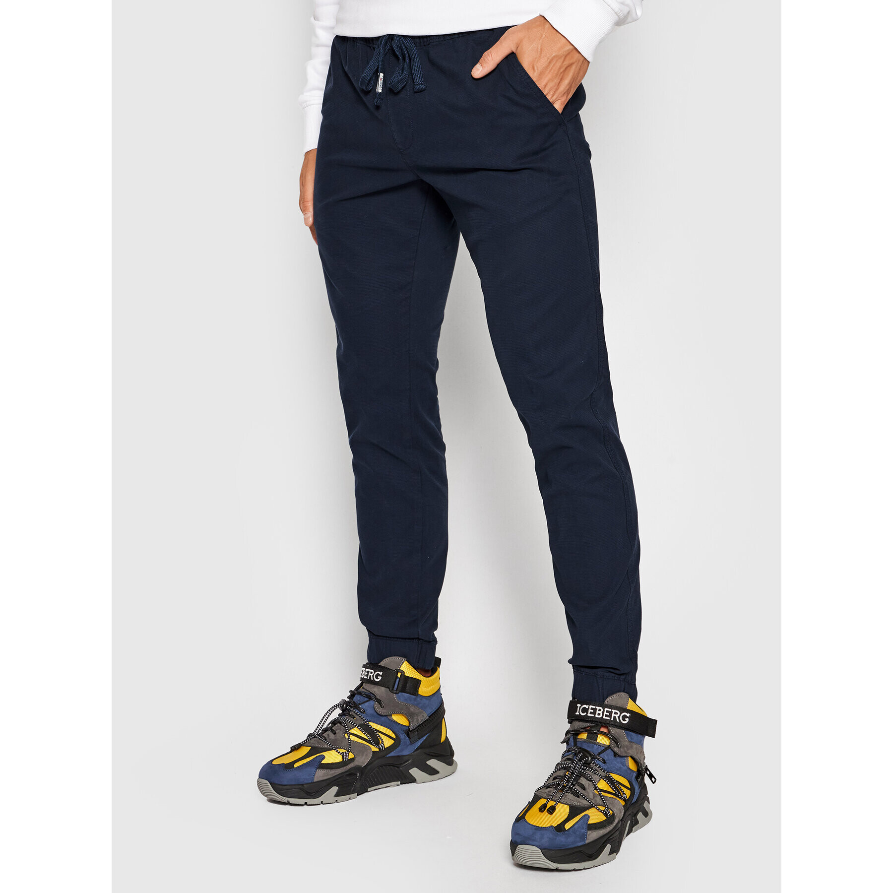 Tommy Jeans Joggers Scanton Dobby DM0DM11032 Bleumarin Regular Fit - Pled.ro