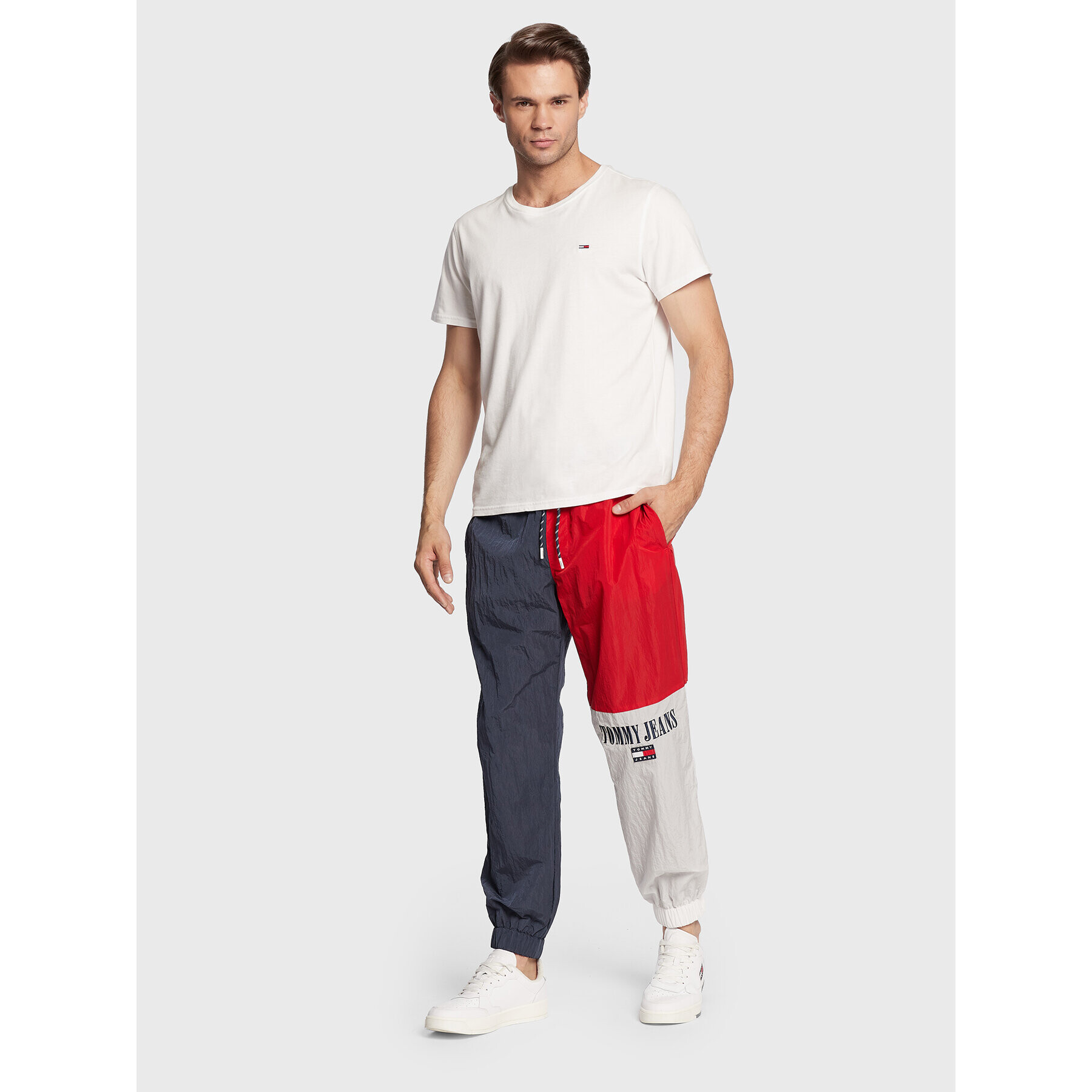 Tommy Jeans Pantaloni trening Archive DM0DM14473 Bleumarin Relaxed Fit - Pled.ro