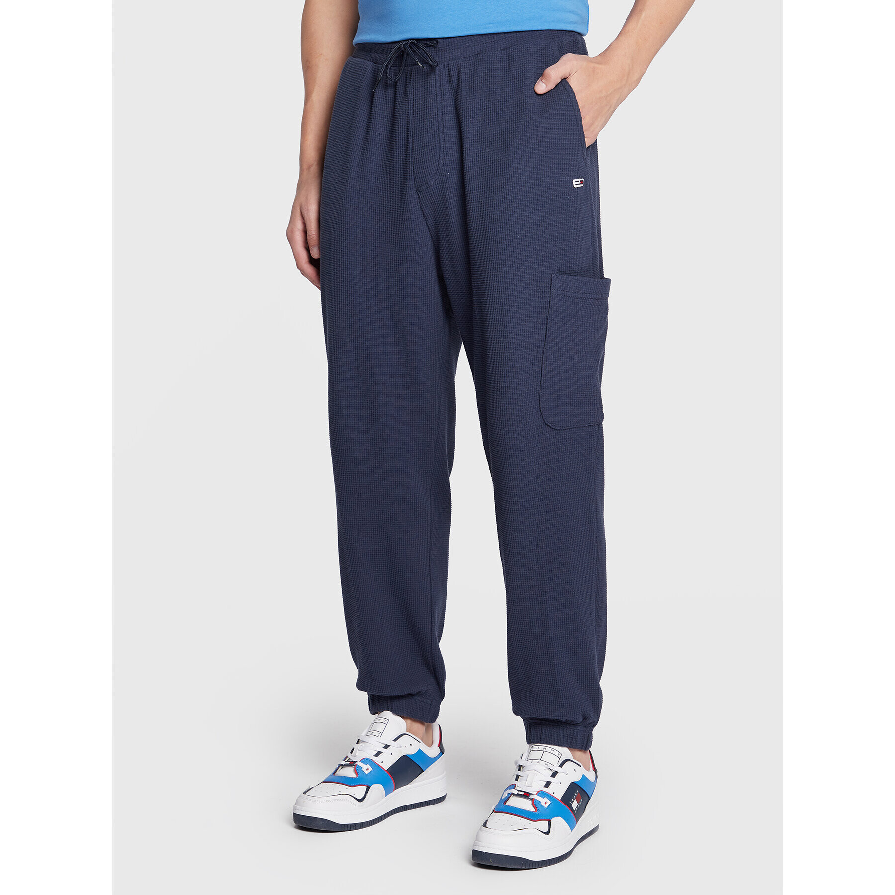 Tommy Jeans Pantaloni trening Bax Waffle DM0DM15032 Bleumarin Relaxed Fit - Pled.ro