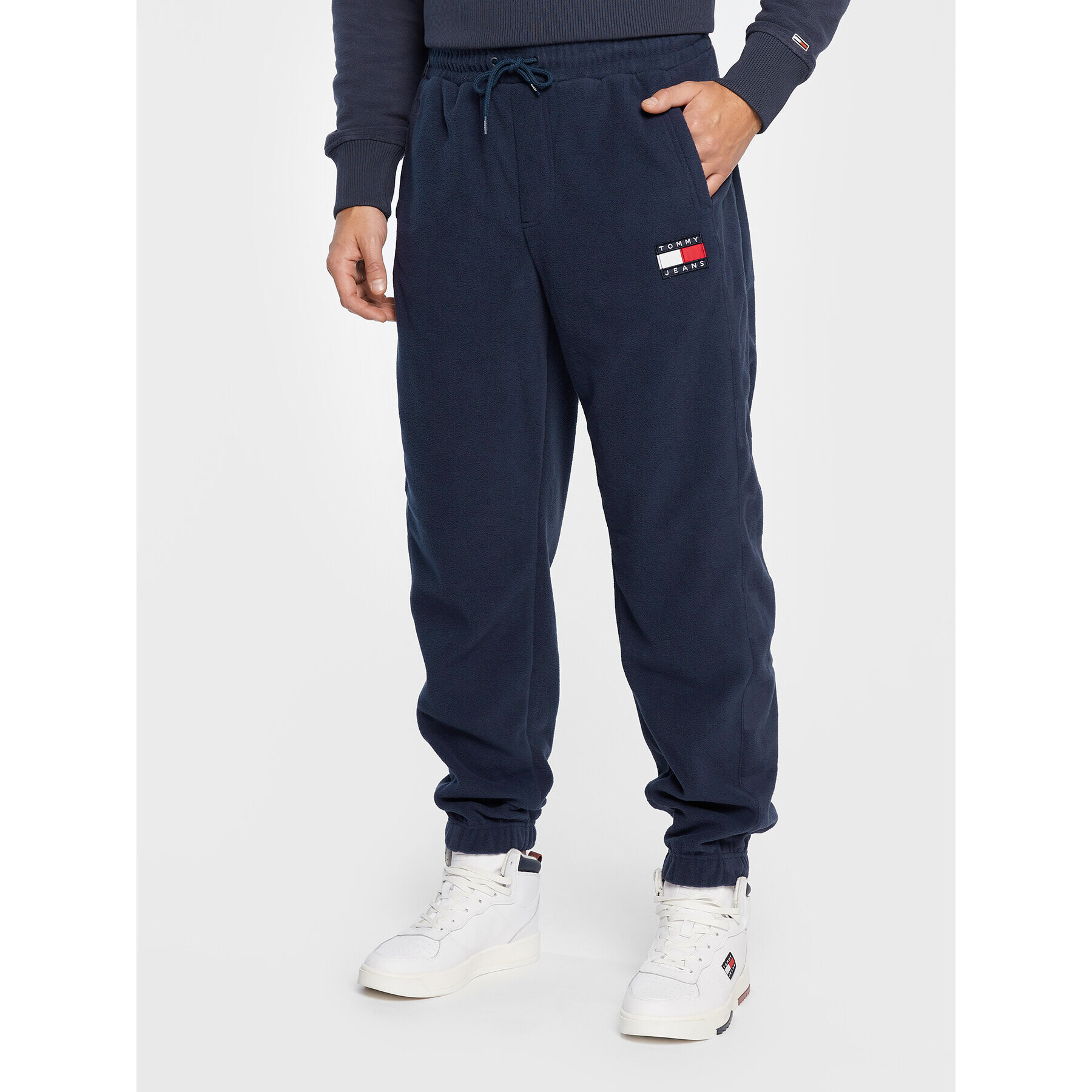 Tommy Jeans Pantaloni trening Checkerboard DM0DM15035 Bleumarin Relaxed Fit - Pled.ro