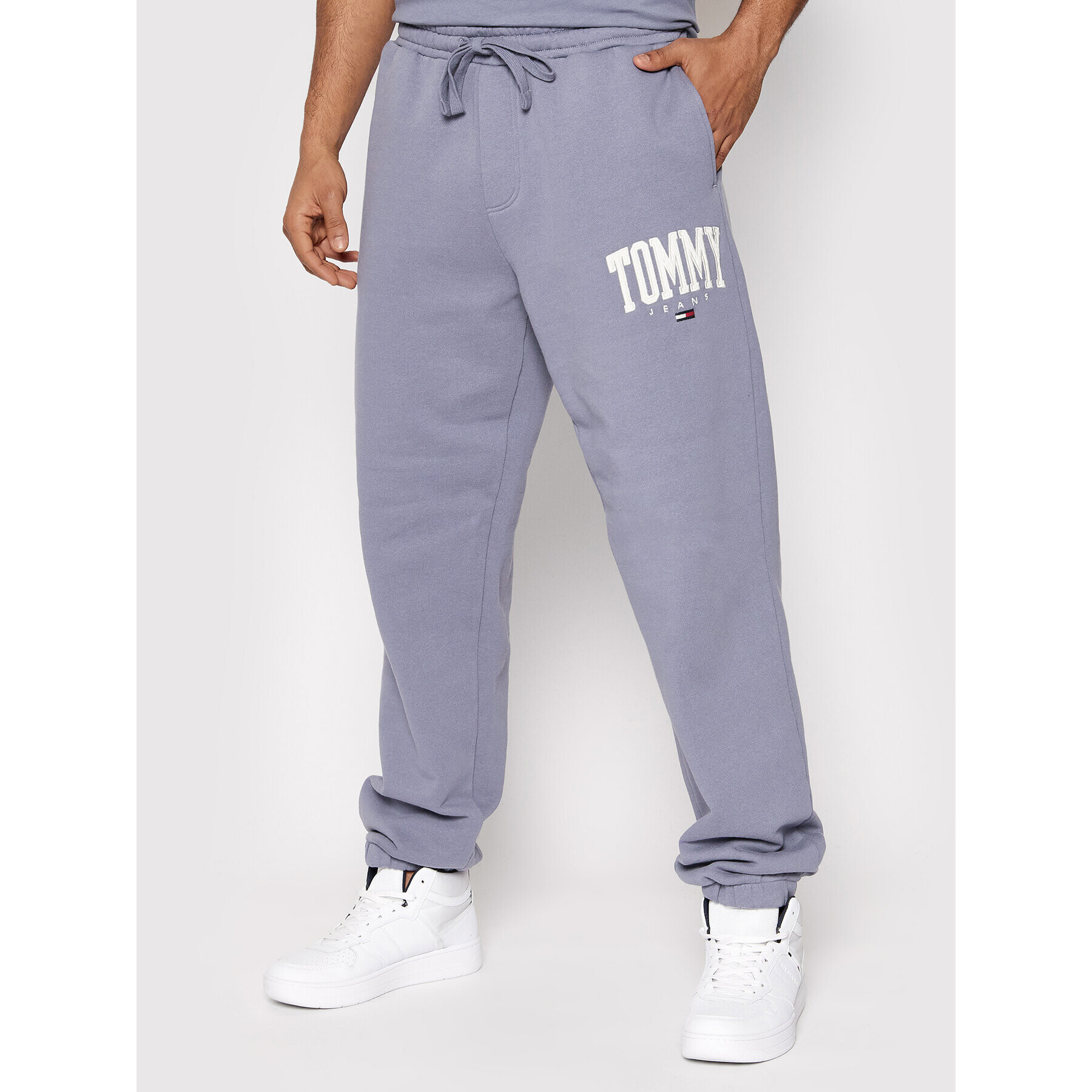 Tommy Jeans Pantaloni trening Collegiate DM0DM12548 Albastru Relaxed Fit - Pled.ro