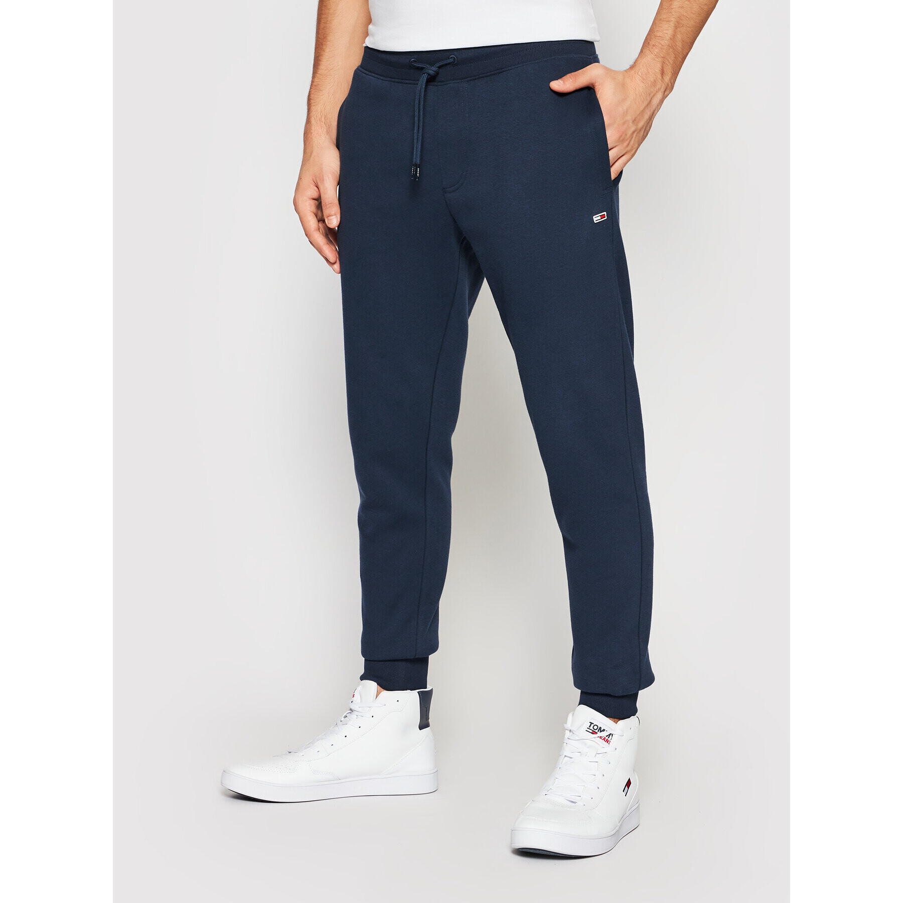 Tommy Jeans Pantaloni trening DM0DM11163 Bleumarin Slim Fit - Pled.ro