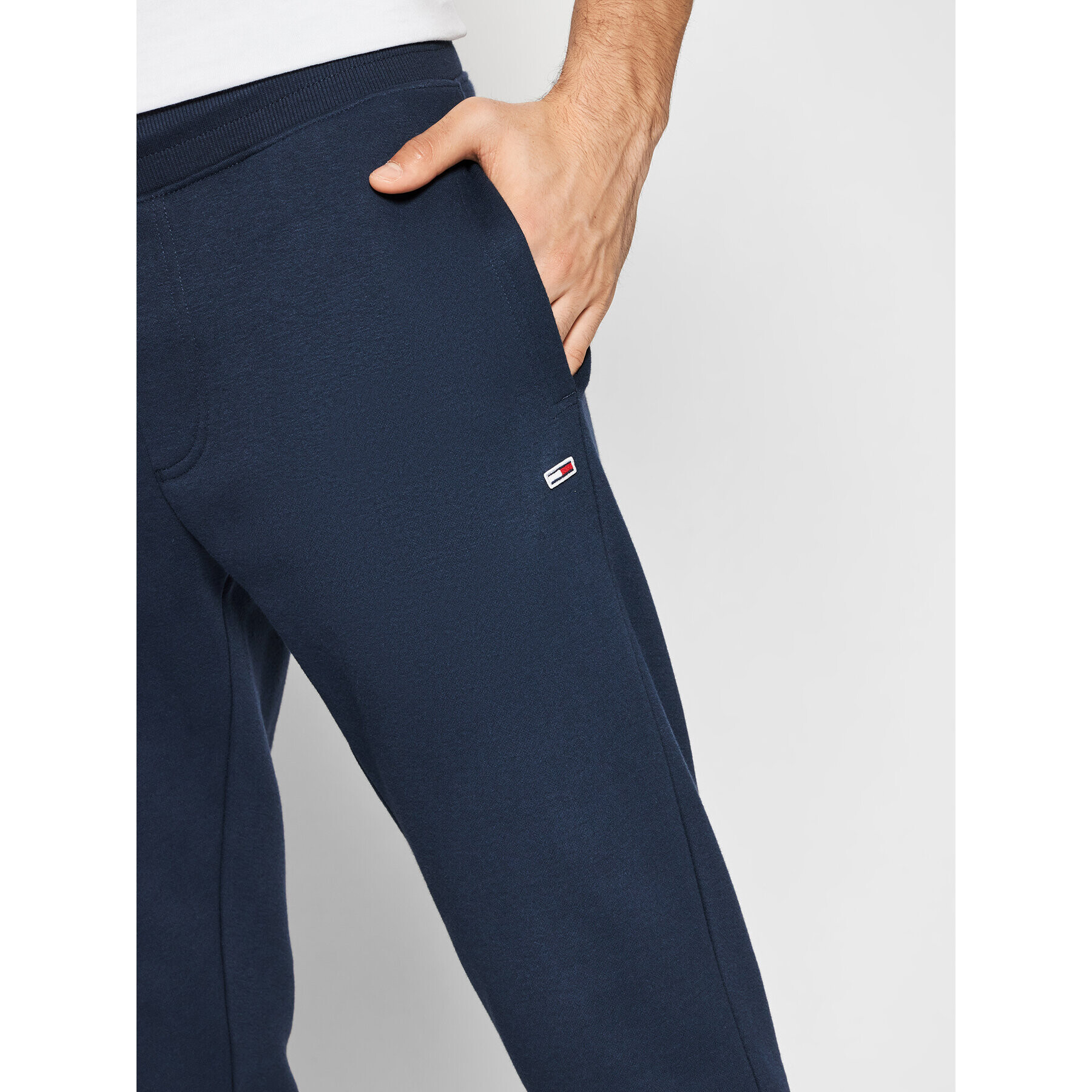 Tommy Jeans Pantaloni trening DM0DM11163 Bleumarin Slim Fit - Pled.ro