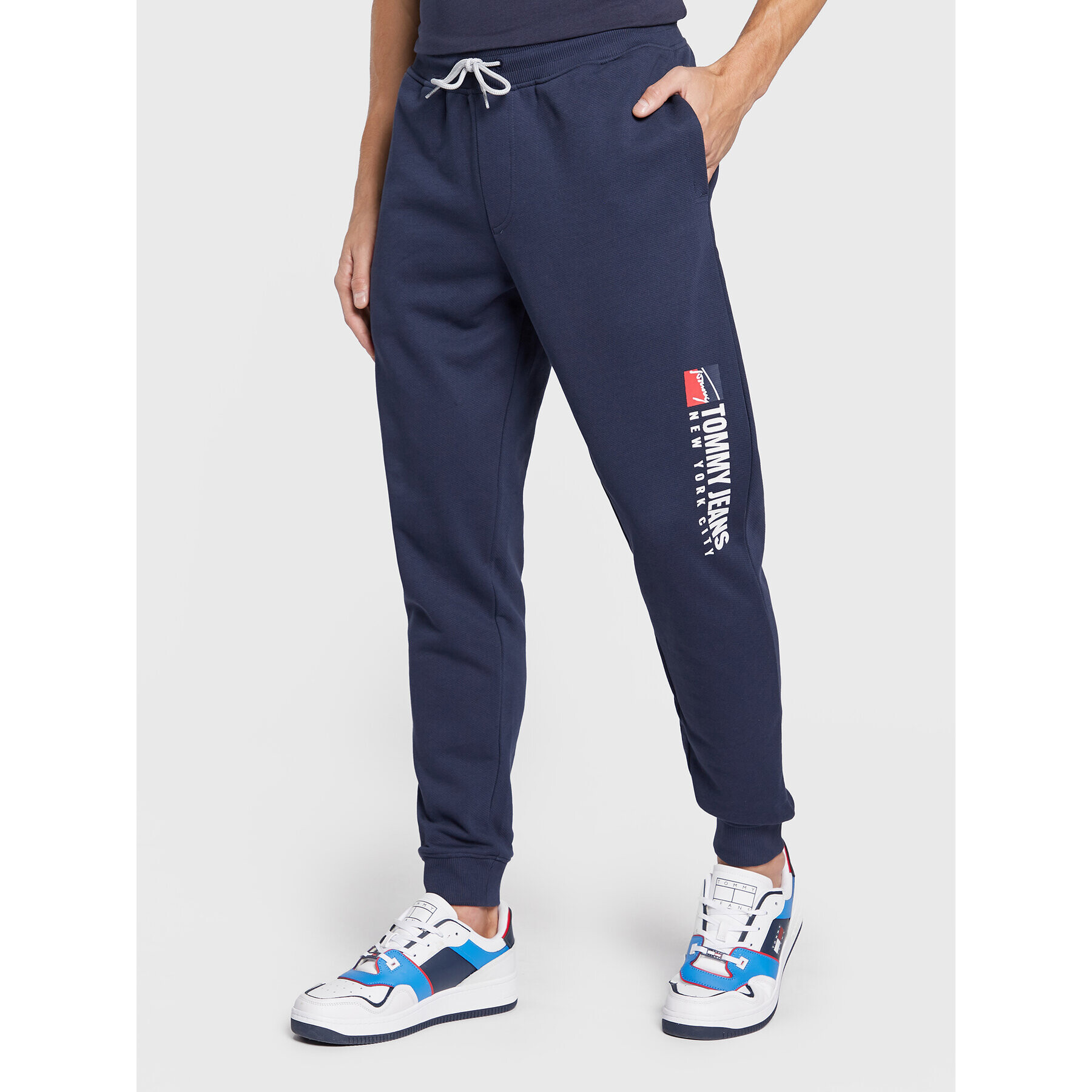 Tommy Jeans Pantaloni trening Entry Athletics DM0DM14273 Bleumarin Regular Fit - Pled.ro