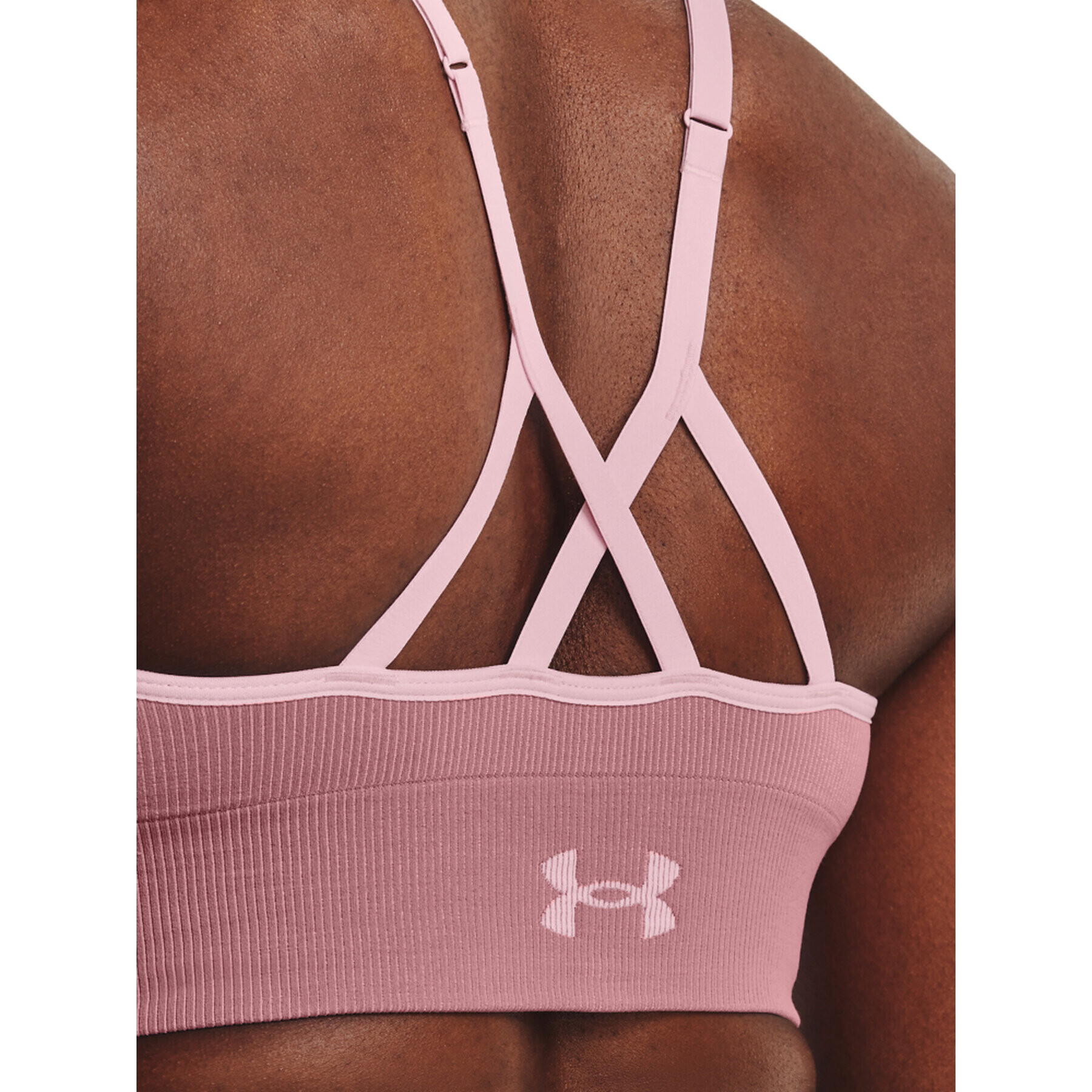 Under Armour Sutien sport UA Seamless Low Long Rib 1373870 Roz - Pled.ro