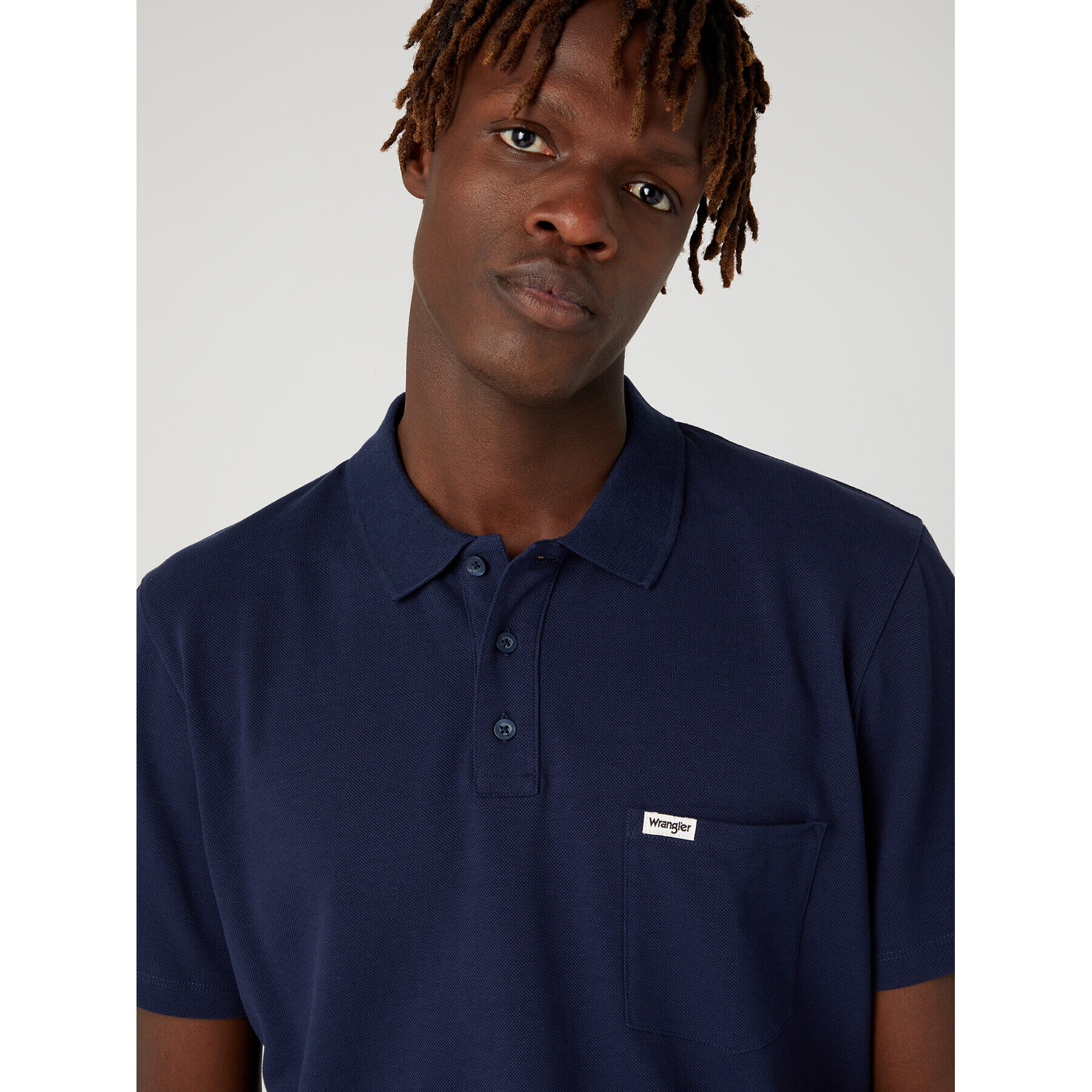 Wrangler Tricou polo W7BJK4114 112330816 Bleumarin Regular Fit - Pled.ro