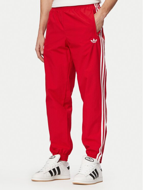 adidas Pantaloni trening Firebird Woven KE1369 Regular Fit