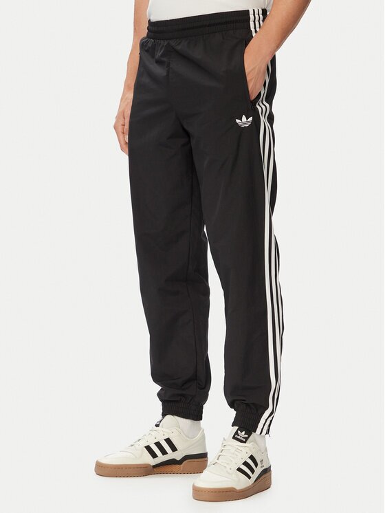 adidas Pantaloni trening Firebird Woven KE1371 Regular Fit