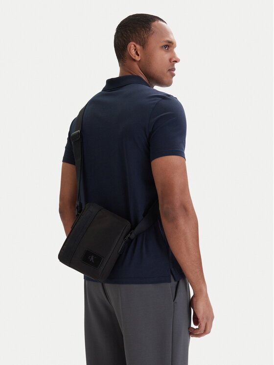 Calvin Klein Geantă crossover Canvas Mix Reporter LV04D3366G