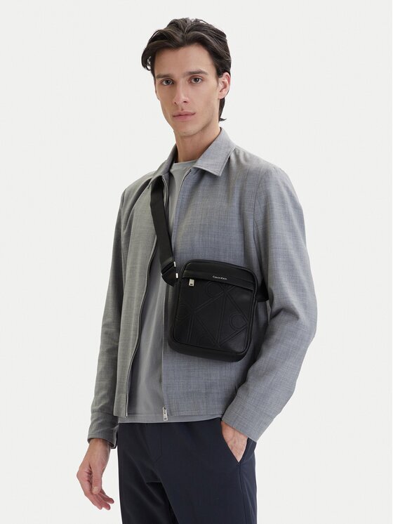 Calvin Klein Geantă crossover Emblem Aop Emboss Reporter LV04D3331G