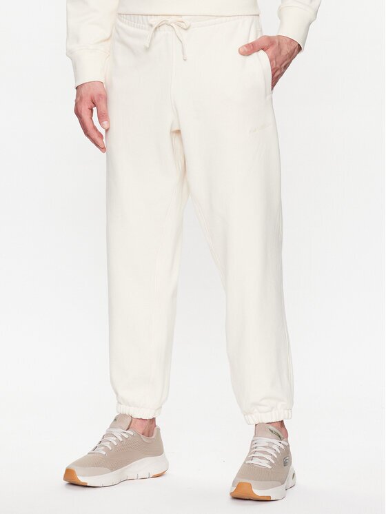 New Balance Pantaloni trening MP23551 Écru Relaxed Fit