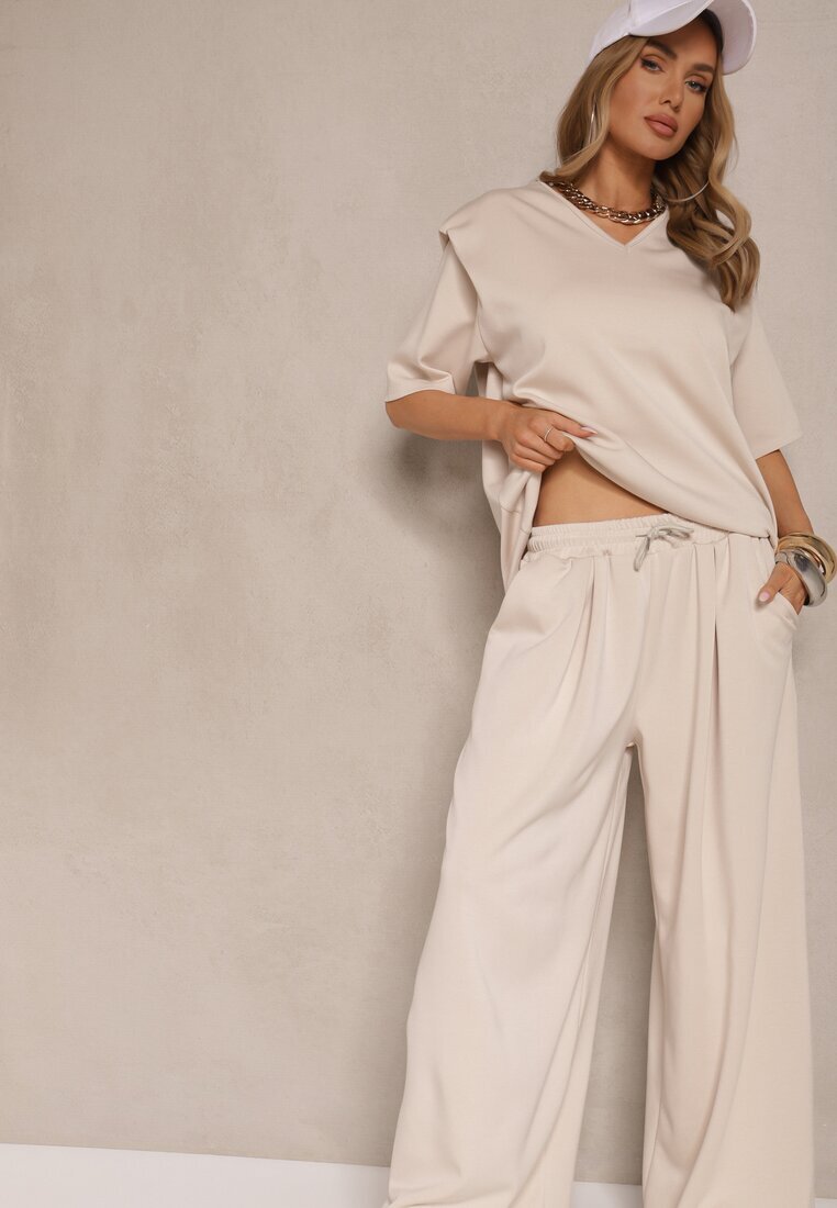 jumelle Set Bej deschis din Viscoză Tricou cu Decolteu în V și Pantaloni cu croială largă Zevline