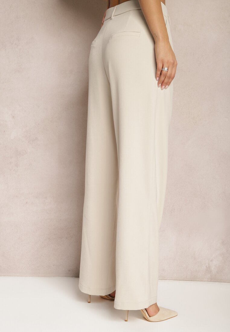 retro & icone Pantaloni de costum bej cu picioare largi și talie înaltă Herdda