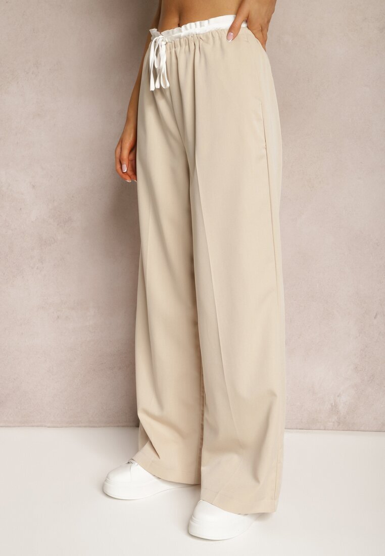 retro & icone Pantaloni din material textil bej deschis cu picioare largi talie înaltă cu elastic în talie Comina