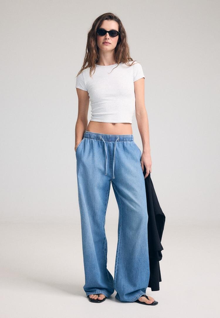 Stradivarius Pantaloni Fluizi Din Denim Cu Șnur Efect Prespălat Denim Albastru Mediu M
